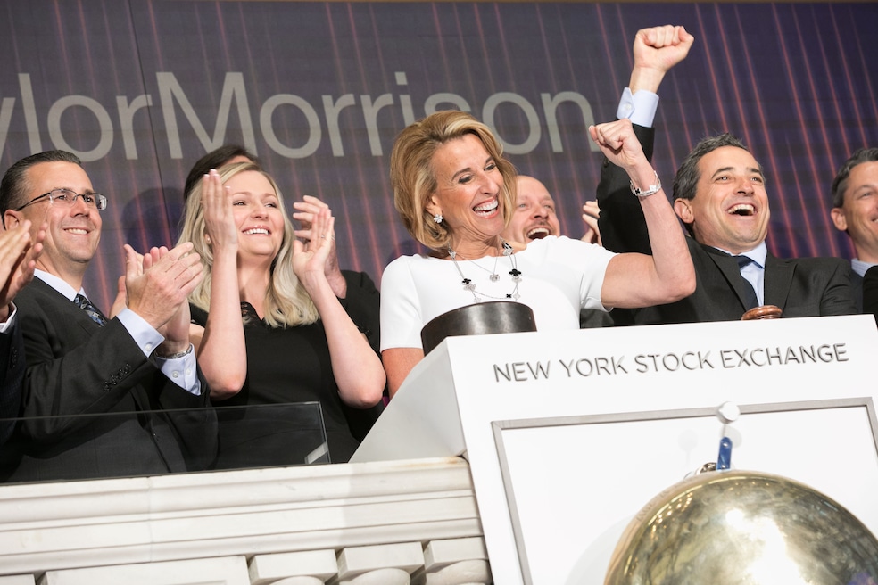 Taylor Morrison is the country's eighth-largest builder and is led by CEO and Chairman Sheryl Palmer, pictured center, celebrating the builder's fifth listing anniversary at the New York Stock Exchange in 2018. (Taylor Morrison)