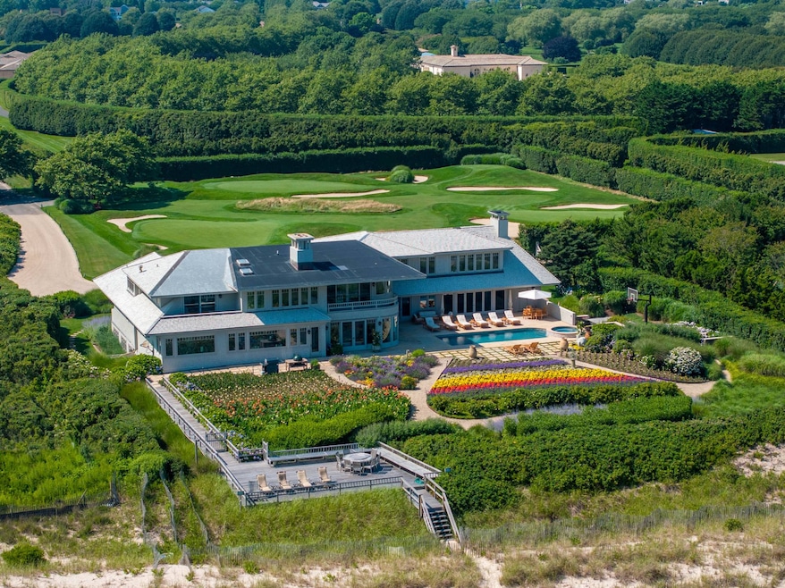 The golf course is on a separate lot west of the main house. (Josh Goetz)