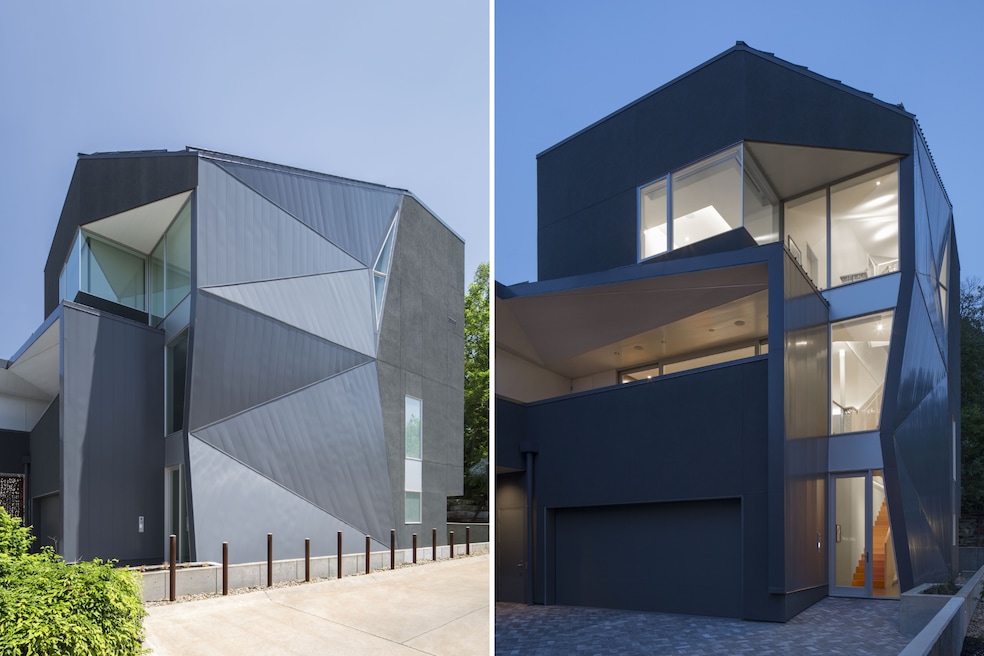 The main home at the rear of the lot features an angular metal wall detail. (Chestnut Hill Realty)