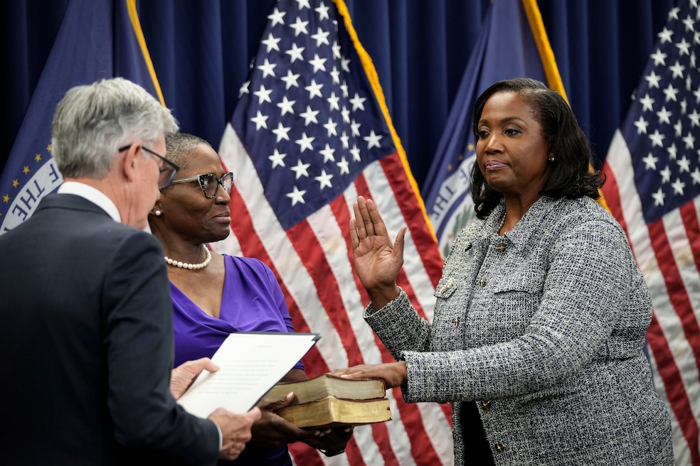 Lisa Cook is sworn in as a member of the Federal Reserve Board of Governors in 2022. She is first Black woman to sit on the Fed board in Washington, D.C. (Drew Angerer/Getty Images)