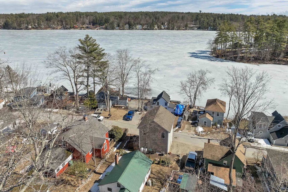 For $450,000, you can buy a lake house in Amherst, New Hampshire, with a one-car garage and an updated kitchen. (David Tyler/Homatti)