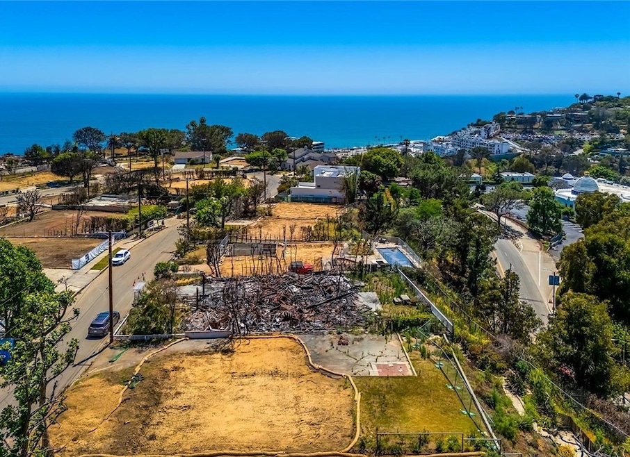 As more residents give up on rebuilding, lots like this 10,774-square-foot cleared one in the Pacific Palisades are hitting the market. The lot at 17047 Bollinger Drive is priced at $2.9 million. (Homes.com)
