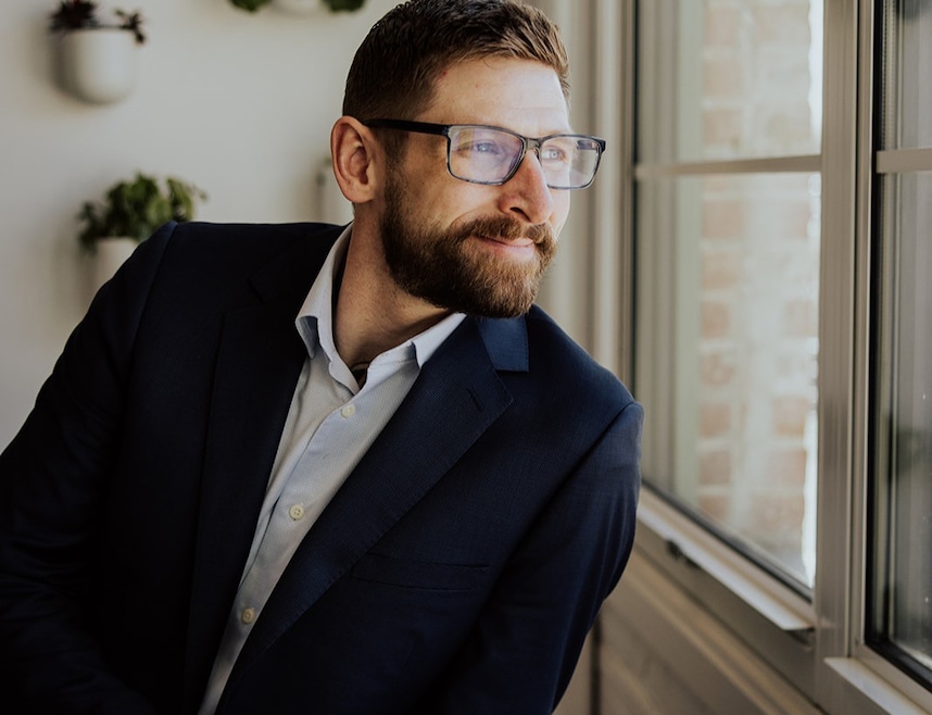 Byron Stuart is a real estate agent with Compass in Denver. He estimates he has done about 10,000 skydives in his life. (Kassia Phoy) 