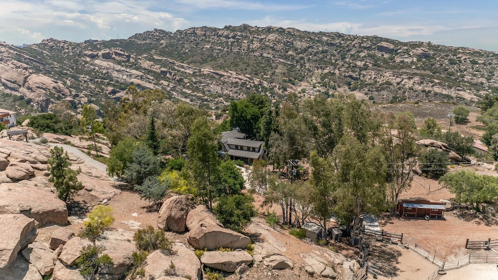 A three-bedroom house tucked between boulders in California is on the market. (Anthony Barcelo)