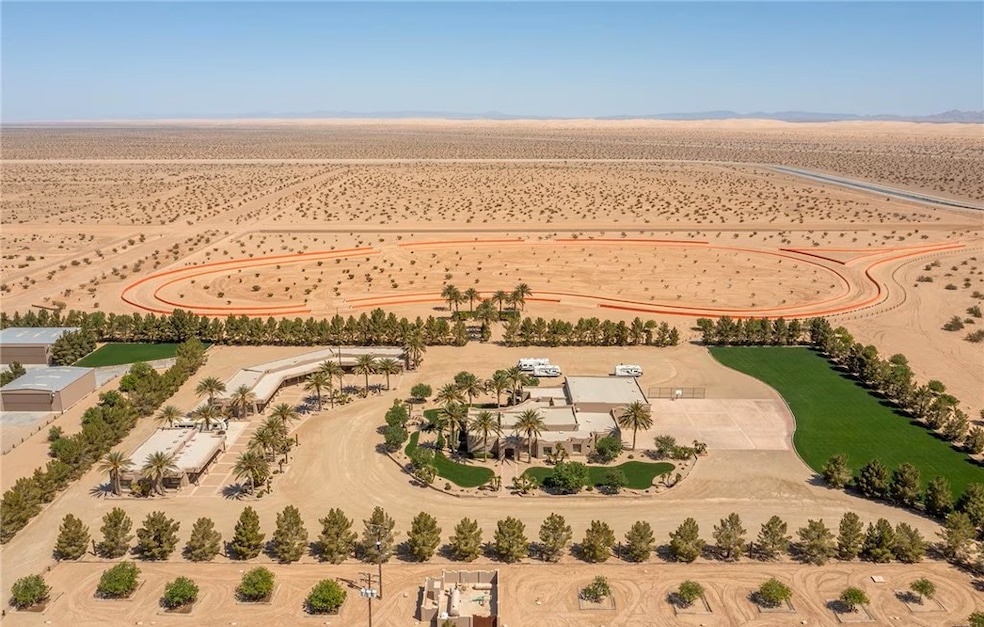 The California desert property at 6650 Evans Hewes Highway features a half-mile racetrack. (Mitchell Realty)