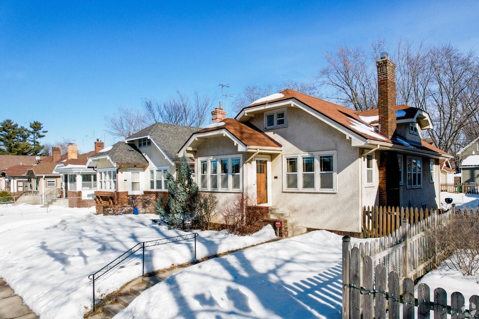 Borrowing costs likely won't see any drastic changes through the end of 2025, economists say. Above, snow blankets lawns in Minneapolis. (David Alexander/CoStar)