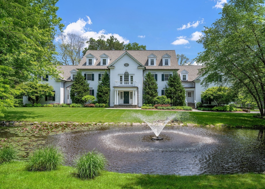 A New England colonial — with a home theater and game room — is on sale for $5.59 million in Purchase, New York. (Houlihan Lawrence)