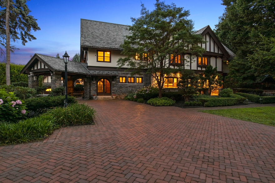 The two-story house at 2615 East Avenue is called Twin Gables because there are two gables in the front of the home. (REAL3D Media)