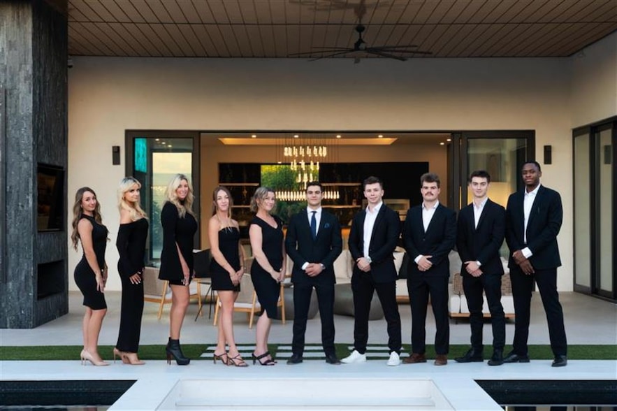 Steele Nash, fourth from right, is part of The Jakobov Group for eXp Realty. Nash specializes in outbound prospecting and marketing unique homes on social media. (The Jakobov Group for eXp Realty)