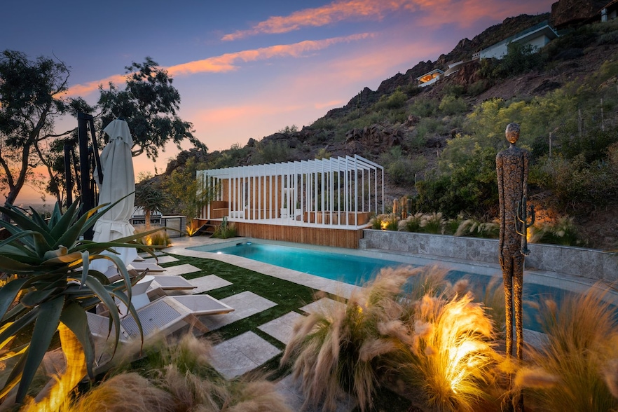 Scottsdale-based Camelot Homes is targeting out-of-state interest in its custom houses throughout Phoenix. Pictured is a view of the pool at Stay Skyeview — a private residence renovated by Camelot's custom home division. (Camelot Homes)