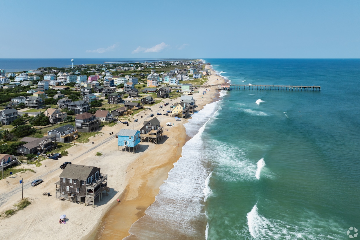 Houses sit on the beach in the Rodanthe section of the Outer Banks in this 2024 photo. (Jon Puckett/CoStar)