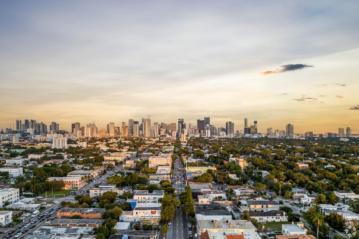 The sun sets over Calle Ocho and nearby Brickell in Miami. (Brian Sokolowski/CoStar)