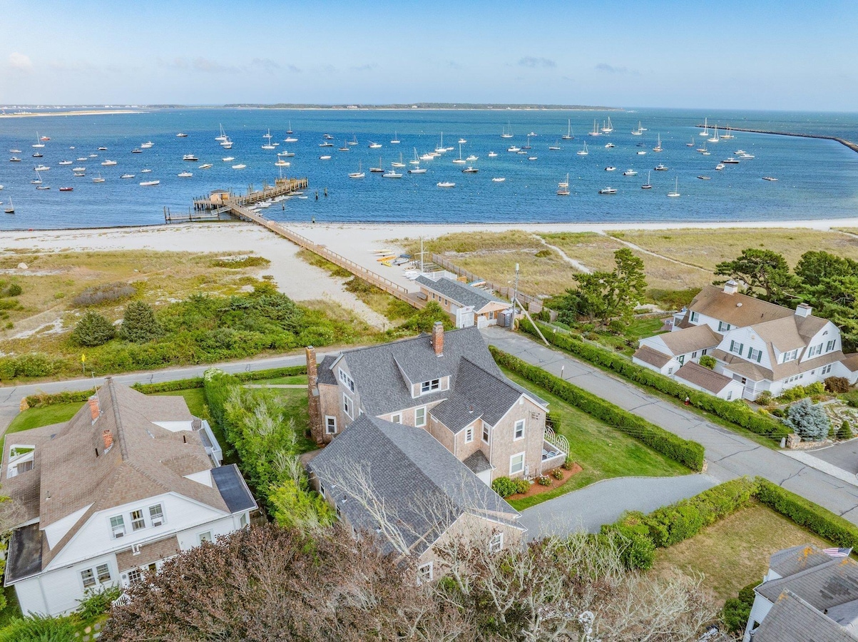 The house (at center) sits across the street from a pier where many locals dock their boats. (Bryan Stearns)