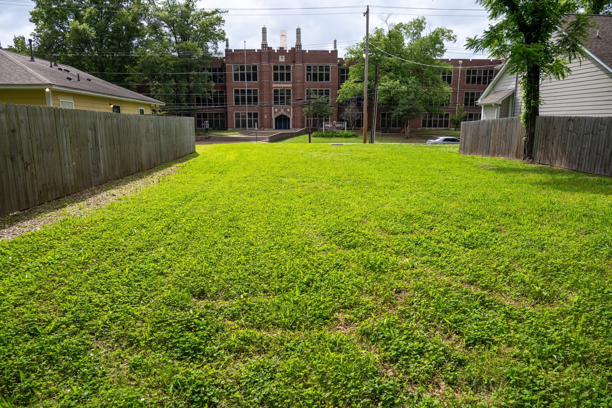 The vacant lot at 660 N. Manassas St., above center, in Memphis, Tennessee, sits across from the now-shuttered high school that Elvis Presley attended. (Andy Greenman/Community Redevelopment Agency)