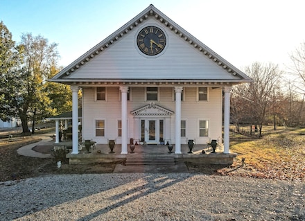 The locally well-known "Clock House" is at 417 Highway 40 W. in Lawrence, Kansas. (Wildlife Properties Land Co.)